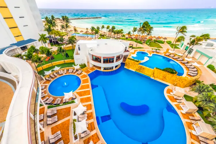 Krystal Grand Cancun resort aerial view with pools and Caribbean Sea Cancun Mexico